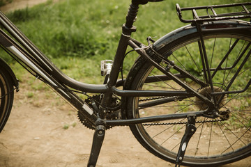 Fototapeta na wymiar Black bicycle in the park. Healthy life
