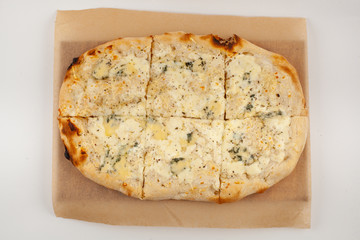 Cheesy roman square pizza with blue cheese, mozzarella and ricotta baked in coal stove and isolated on white background