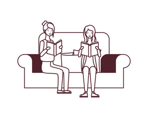 women sitting on chair with book in hands