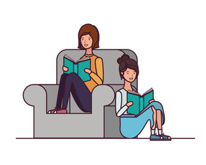 women sitting on chair with book in hands