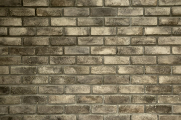 Brown brick wall in building as interior background