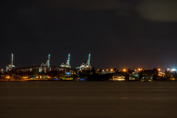 Night photo Port of Miami industrial cranes