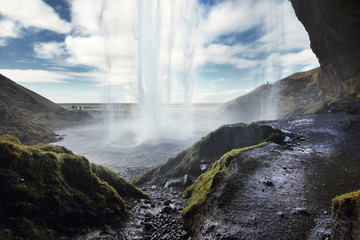Beautiful scenery of Seljalandsfoss waterfall in Iceland. Seljalandsfoss is the famous natural landmark and tourist destination place of Iceland. Travel and natural Concept.