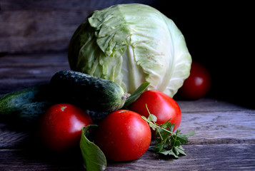 Vegetables from the garden in the village, tomatoes, cucumbers, cabbage, onions.