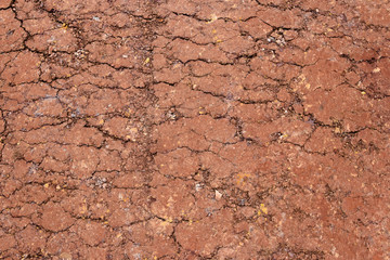 Laterite gravel ground crack background pattern