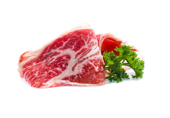 Fresh raw beef meat slices isolated over white background