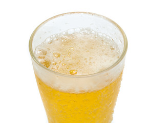 Glass of cold beer on a white background