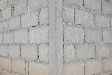 Old corner conctete blocks wall texture and background.