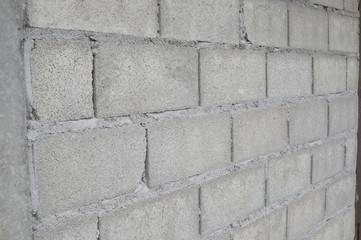 Old conctete blocks wall texture and background.