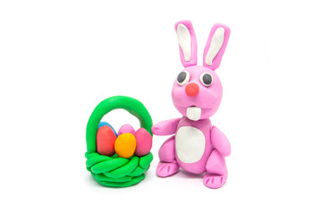 Play dough rabbit on white background. Handmade clay plasticine