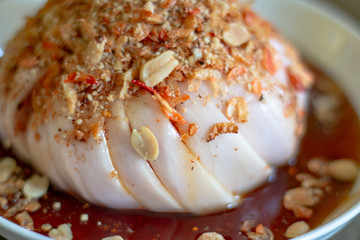 Santol with sweet spicy sauce. Santol fruit or cotton fruit, is a tropical fruit grown in Southeast Asia. It has a sour taste.