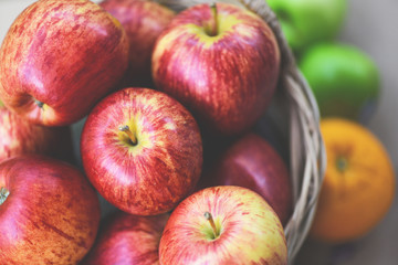 Fototapeta na wymiar Fresh Red Apples Orchard - harvest apple in the basket collect fruit garden