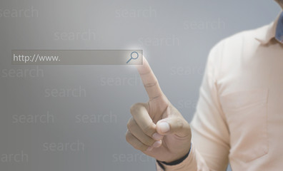 Technology  searching system and internet concept  man hand pressing Search button