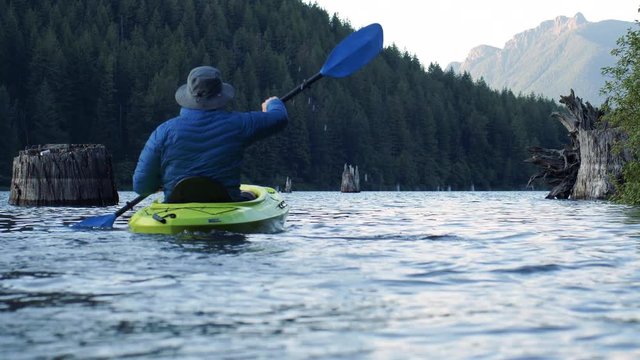 Escape to Nature Kayak Adventure on Pristine Alpine Lake Slow Motion