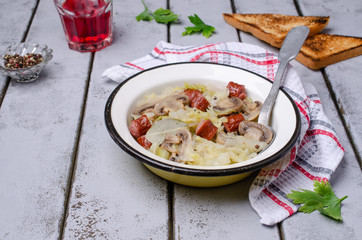 Stewed vegetables with sausages