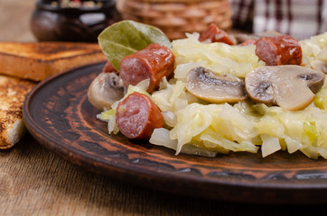 Stewed vegetables with sausages