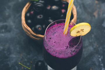 Juice of jamun fruit in a glass also called as java plum, jambolan plum, jambhul, syzygium cumini