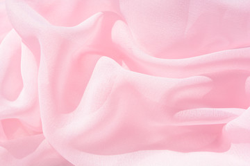 Texture chiffon fabric pink color for backgrounds