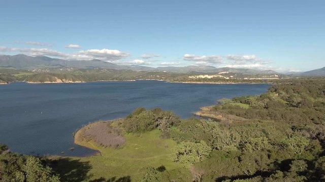 Aerial Flying in shot of Cachuma Lake during the day