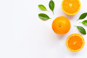 Fresh orange citrus fruit with leaves isolated on white background.