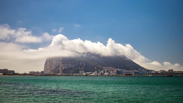 Time-lapse of the clouds locally know as the "levanta" moving over the rock of Gibraltar