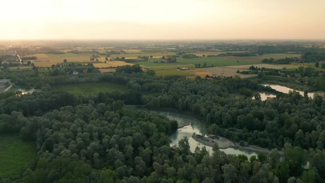 4K Aerial : Dramatic and cinematic spotlight shot of a rural landscape