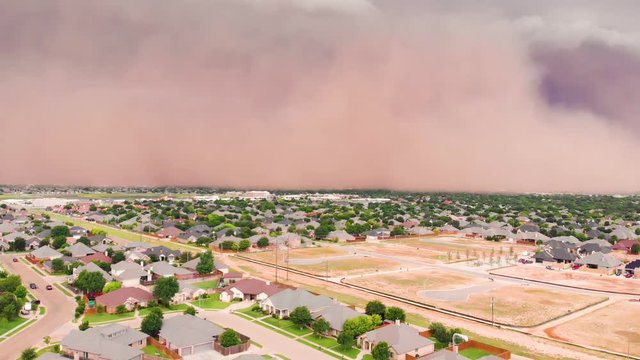 4K Ariel Rising Footage Of A Giant Dust Storm Or Haboob Approaching A Suburb In Lubbock, Texas