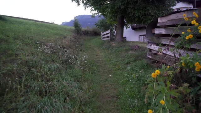 Hiking near a farm at san valentino dolomites