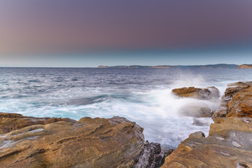 Fototapeta na wymiar Sunrise Seascape from the Headland with Clear Skies