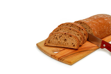 Rye bread and slices on a white background.High fiber content. The concept of a balanced diet. Selective focus, layout, side view.