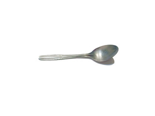 the metal shiny spoon on white background