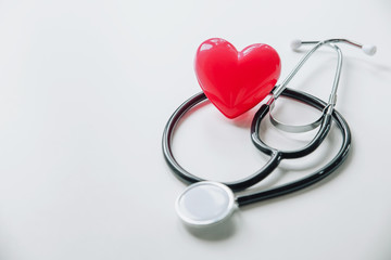 World health day.Red heart with stethoscope on white background, heart health,world health day.