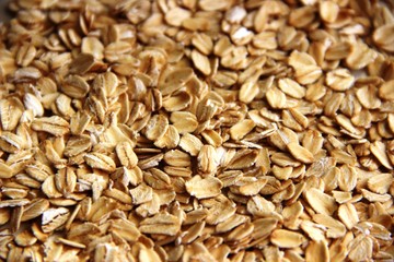 Lots of oatmeal or oat flakes as background. concept Useful oat flakes gluten free