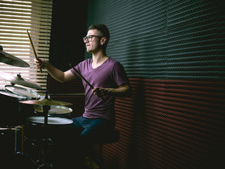 Drummer in recording studio