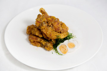 Crisp fried shrimps tempura with egg. Seafood tempura cuisine dish.