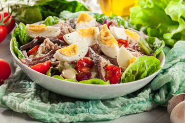 Nicoise Salad with tuna, anchovy, eggs and tomatoes