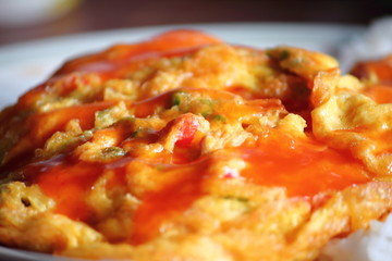 Thai style omelet on the plate