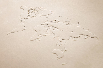 a world map made of embossing paper