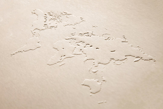 a world map made of embossing paper