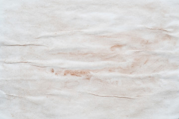 White and brown acrylic paint abstract art background. Colored textured paper surface.