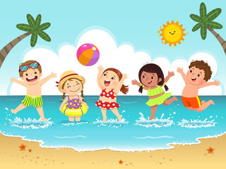 Group of happy kids having fun and splashing on the beach.