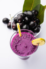 Juice of jamun fruit in a glass also called as java plum, jambolan plum, jambhul, syzygium cumini