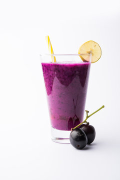 Juice of jamun fruit in a glass also called as java plum, jambolan plum, jambhul, syzygium cumini