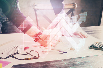 Businessman with creative business upward arrows on people hands background. Financial growth concept. Double exposure