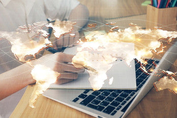 International business hud over woman's hands writing background. Concept of hard work. Double...