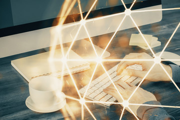 Obraz na płótnie Canvas Social network theme hologram with businessman working on computer on background. Multi exposure.