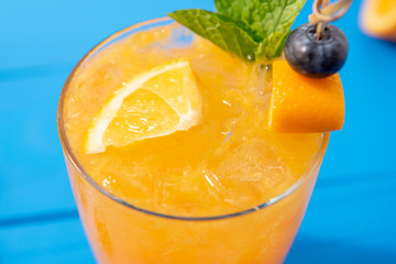 Close up of iced summer orange refreshing drink