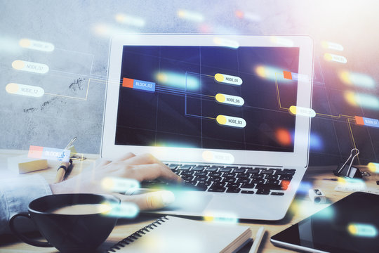 Double exposure of data internet theme hologram with man working on computer on background. Concept of innovation.