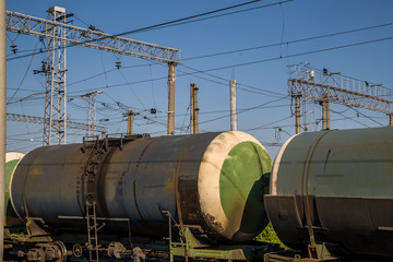 Fototapeta na wymiar a train loaded with cisterns goes by rail