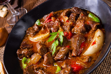 classic beef goulash with peppers and onions